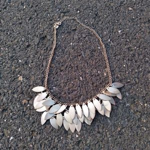 Golden color statement leaf detail necklace